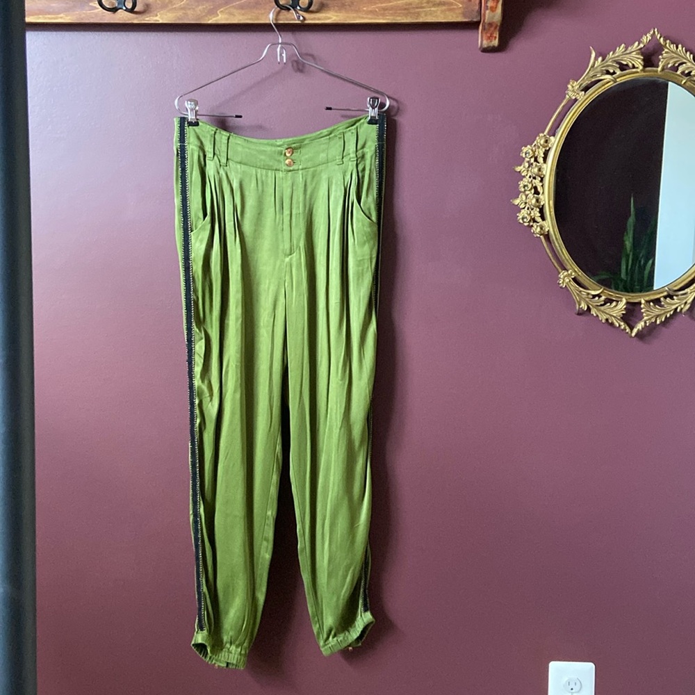 Anthropologie green joggers with black and gold trim